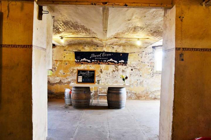 a stove top oven sitting inside of a building