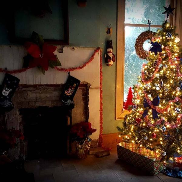 a christmas tree in a room