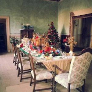 a living room filled with furniture and a fire place
