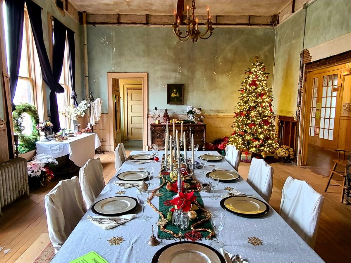 a living room filled with furniture and a fire place