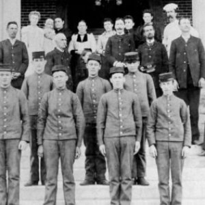 a group of men posing for a photo