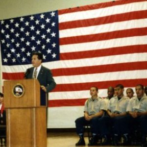 a group of people standing in front of a crowd