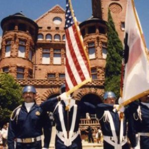 a group of people standing in front of a building