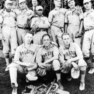 a group of baseball players posing for a photo