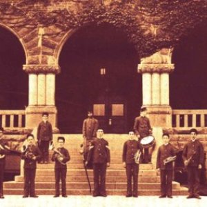 a group of people standing in front of a building