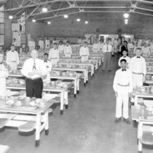 a group of people standing in a room