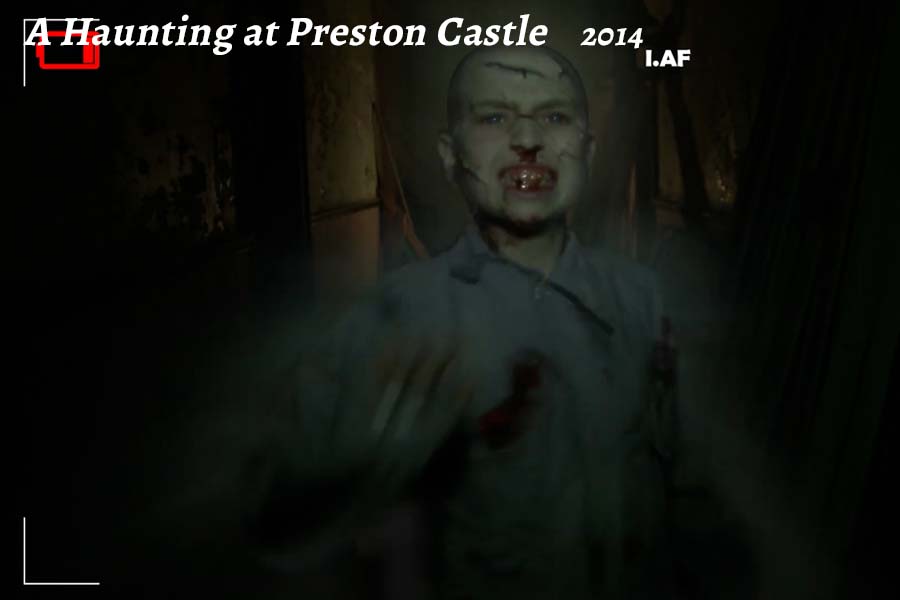 a boy taking a selfie in a dark room