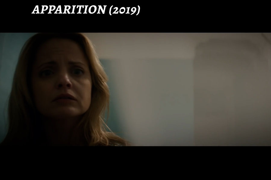 a woman looking at the camera