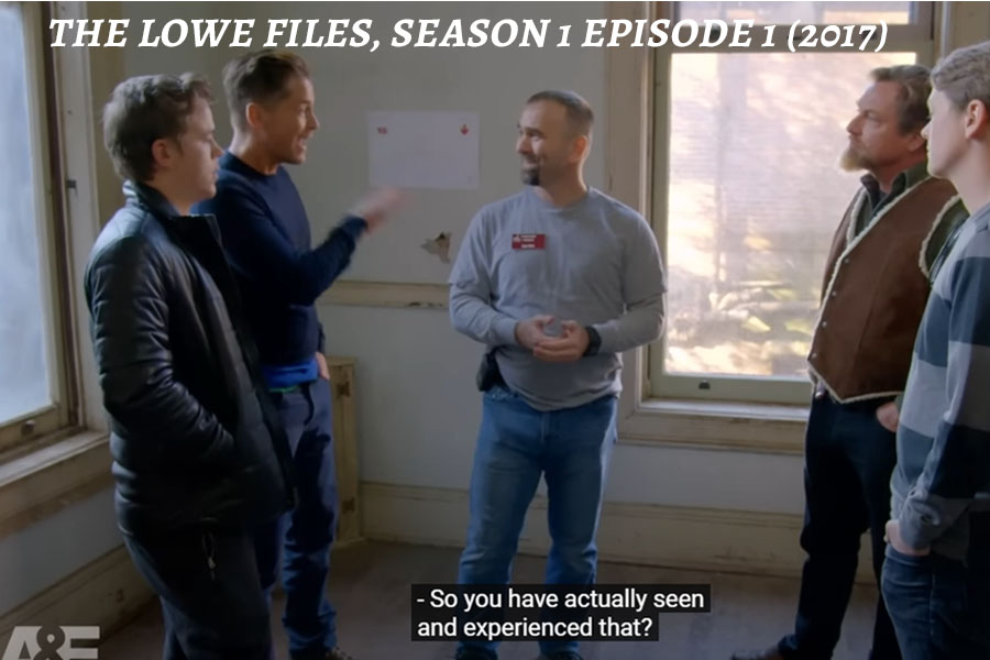 a group of people standing in a room