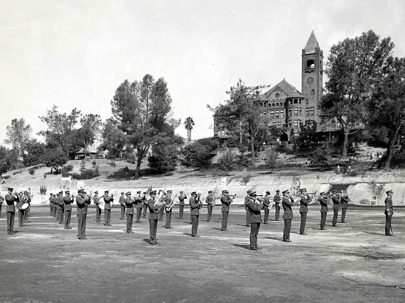 a group of people walking down the street
