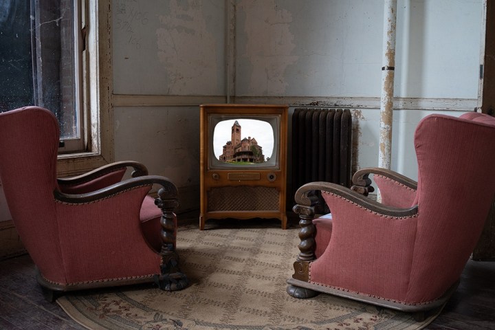 a chair sitting in front of a window